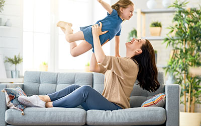 Mother and daughter playing in the healthy room environment