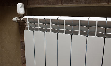 white radiator on wall
